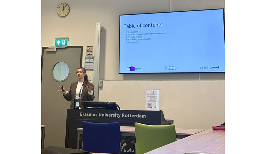 A female presenting at the research conference