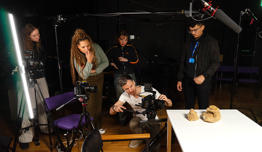 A group of people on prepare to start filming