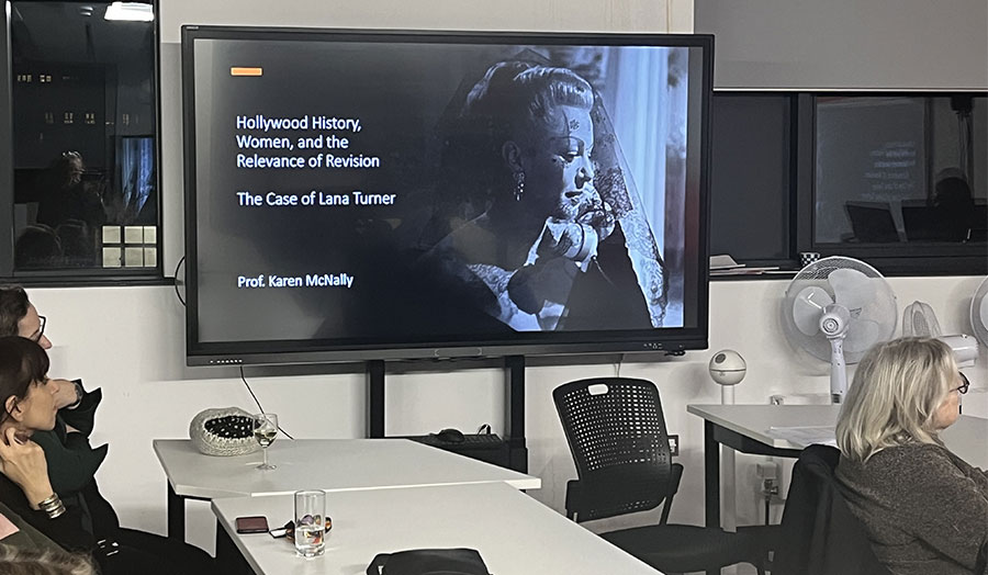 An audience listening to a lecture