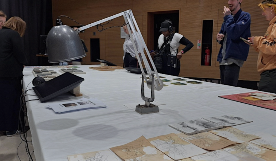 Participants are looking at various images spread across the table. 