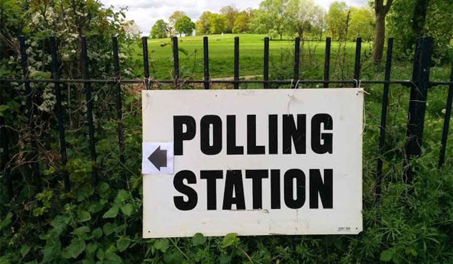 A sign for a polling station near Hampstead Heath