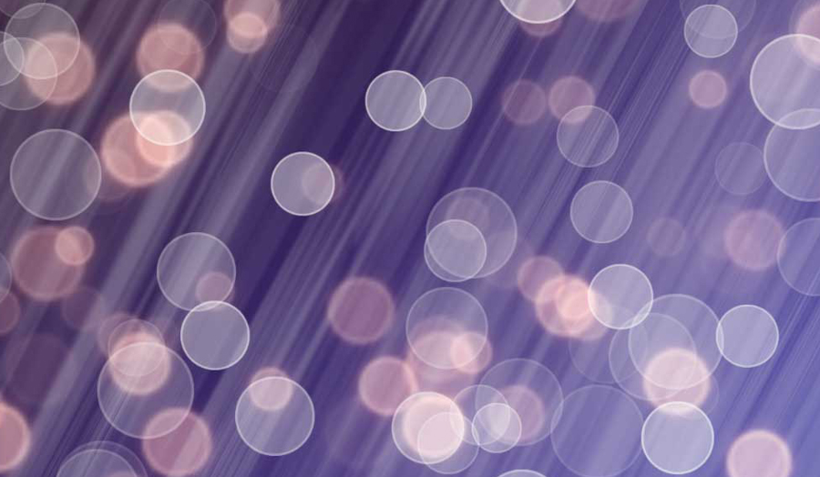 Abstract photo of washed-out circles and dot on a purple background