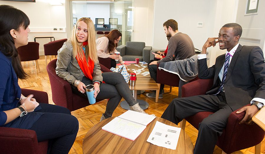 Students chatting in Aldgate study area