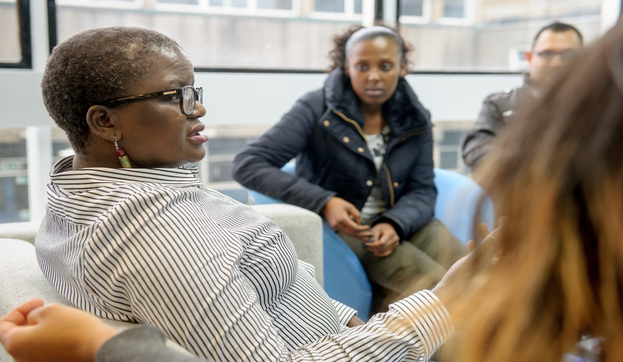 Postgraduate students chatting 