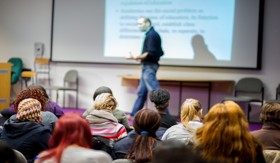 Lecturer presenting in front of the class