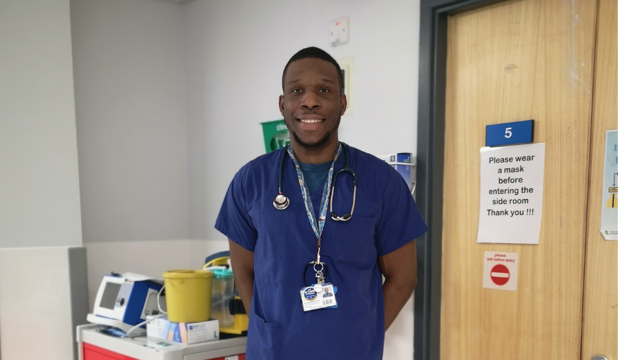 munachimso wearing scrubs in a hospital