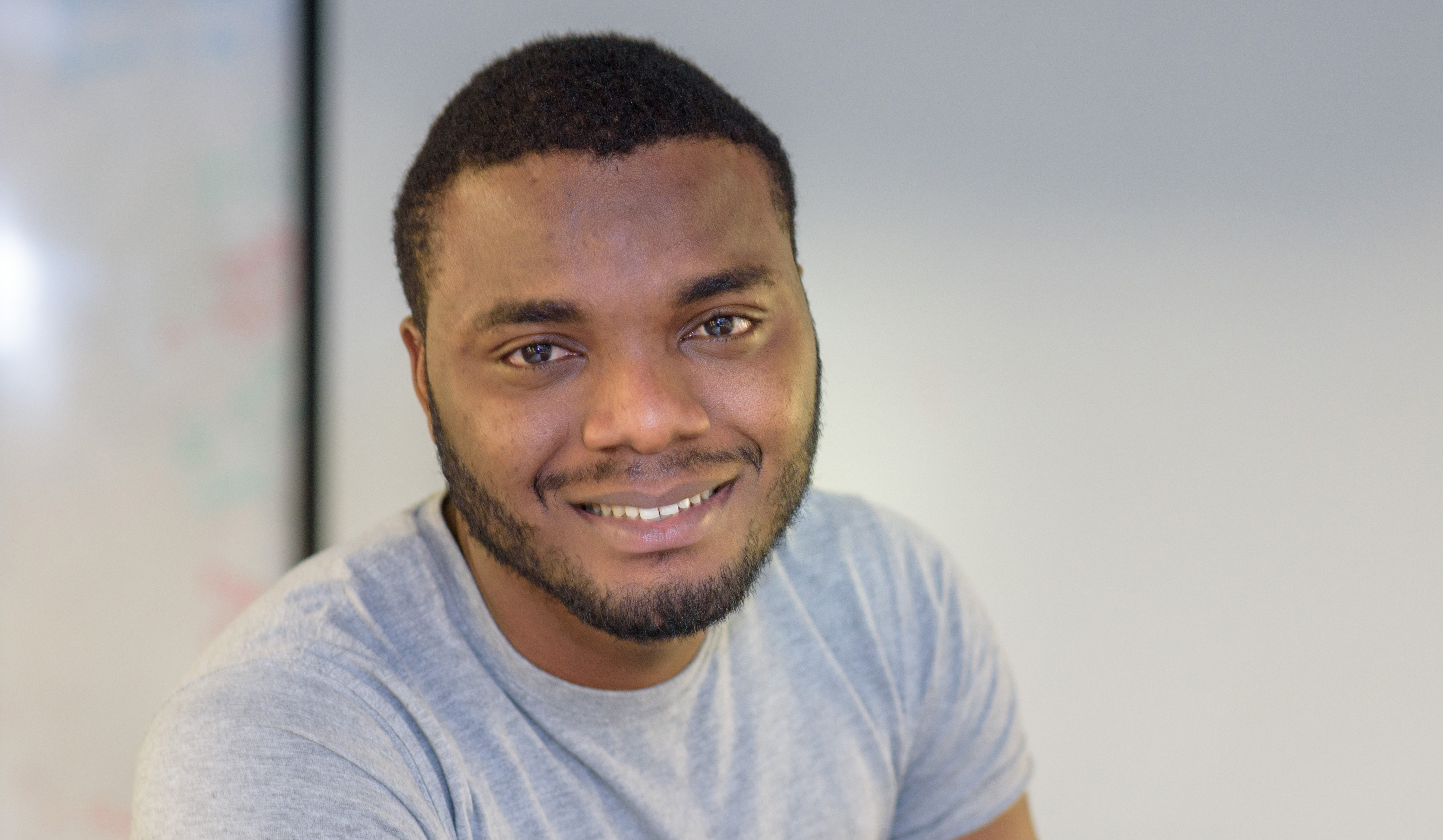 Abayomi Wasiu Ajala, a happy looking male scholar