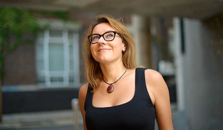 Ania smiling pictured outside Holloway Road campus