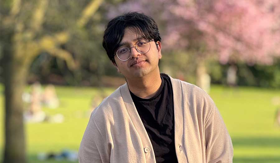 Animesh in a cardigan pictured in a local park