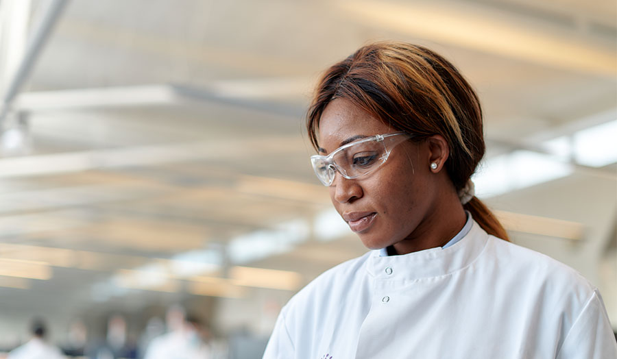 Chipo pictured on a return visit to London Met's science labs