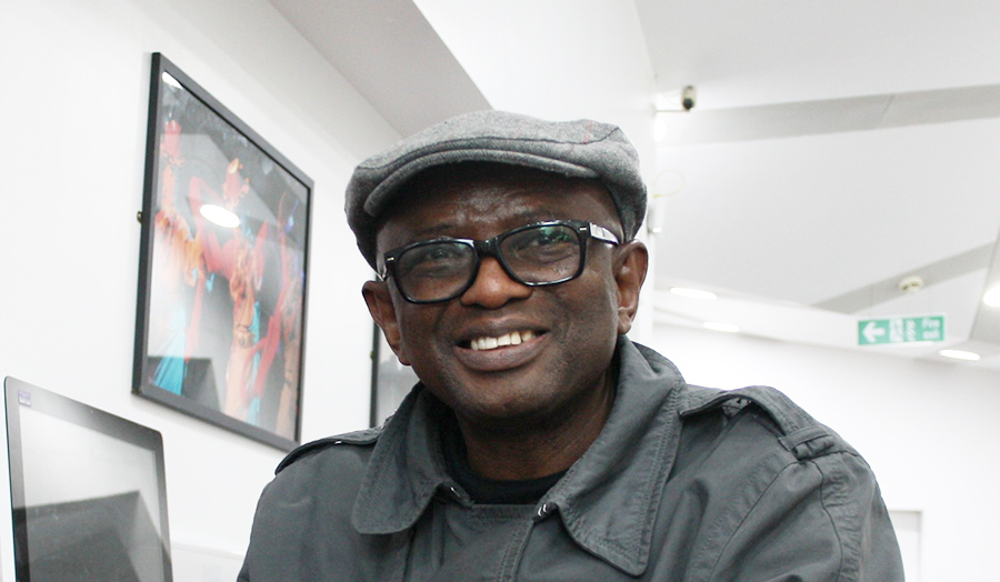 Head shot of Dennis Ayerume smiling