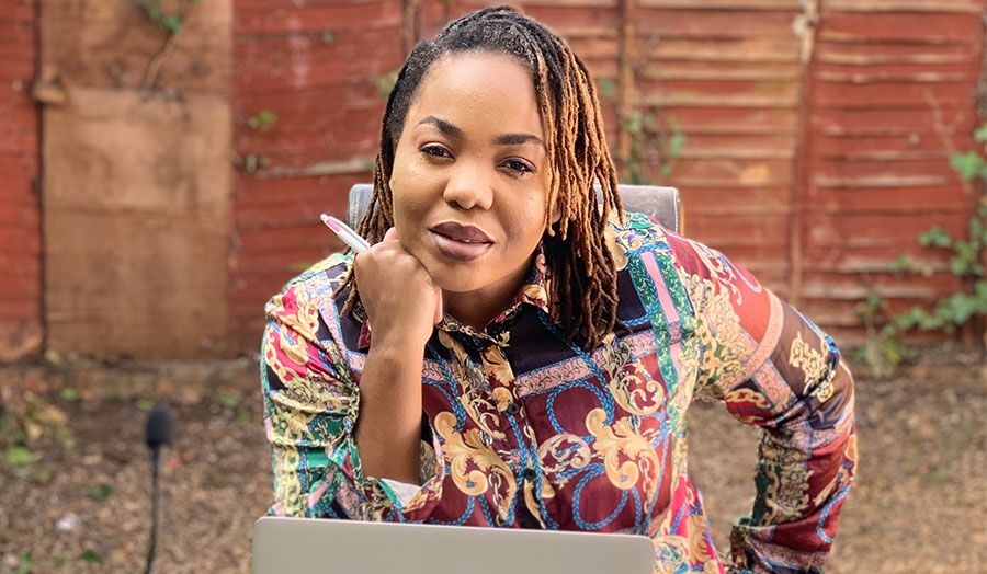 Marie-France Nguo working on a laptop