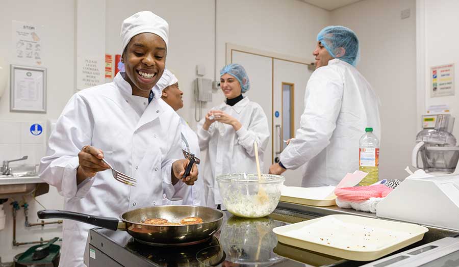 students having fun in the kitchen